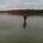 Fish on! Notice the wed wading tactics.