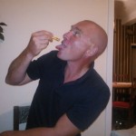 Paul demonstrates the correct method of eating honey-capers.