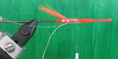 Double back tail material and tie down
