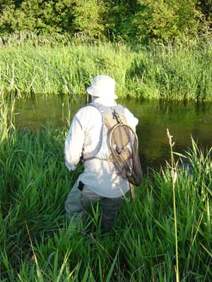 The back allows you to attach net and carry loads of gear :-)