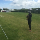 Ashly practising accuracy at the campground
